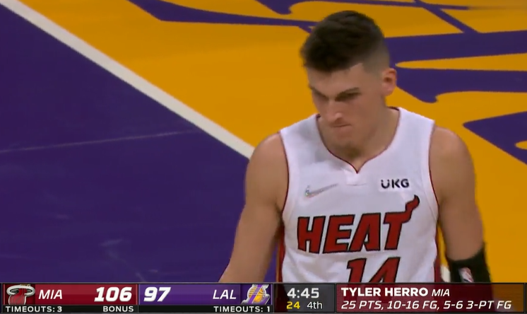  巴特勒三双热火加时险胜尼克斯  